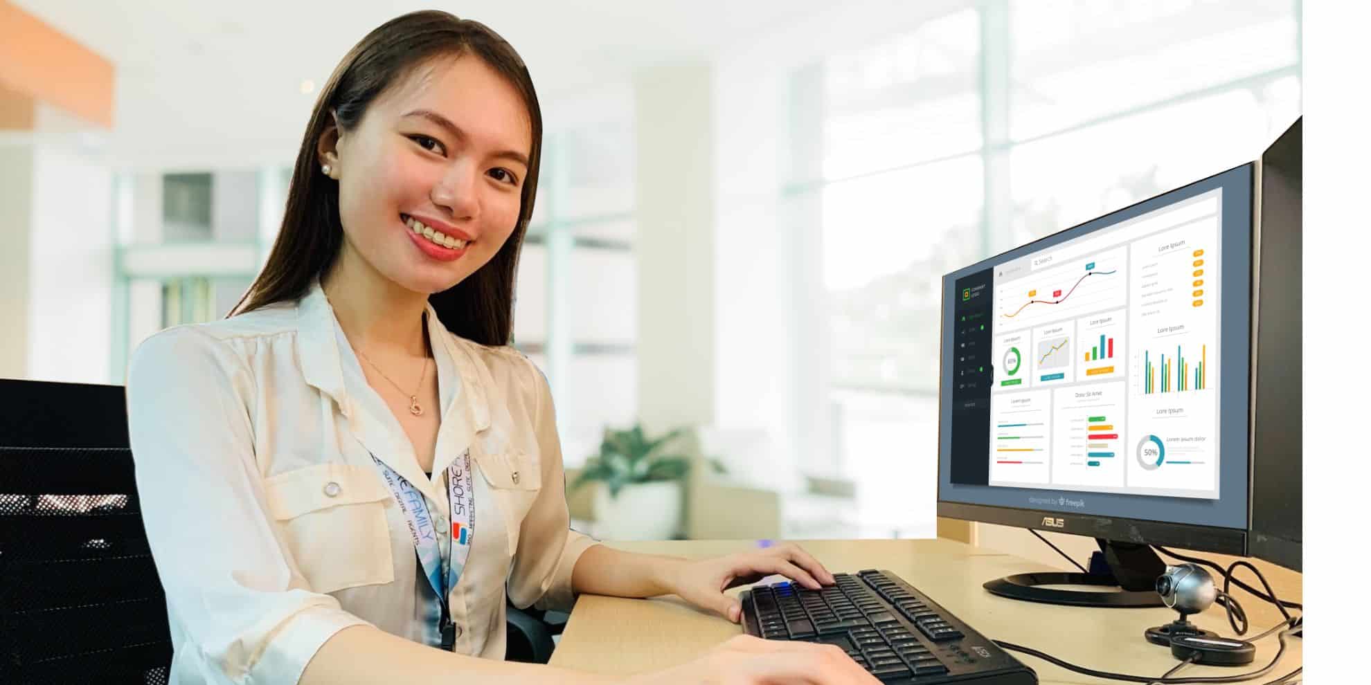 Employee working, looking at the camera